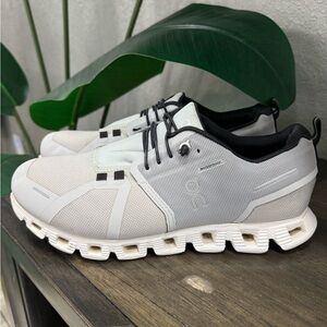 On Running Men's White and Black Athletic Shoes
